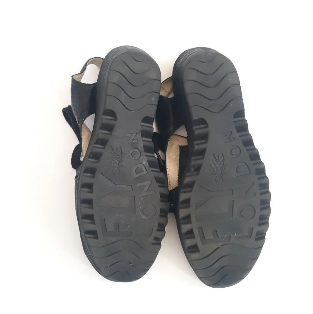 Fly London Ylfa Perforated Black Leather Wedge